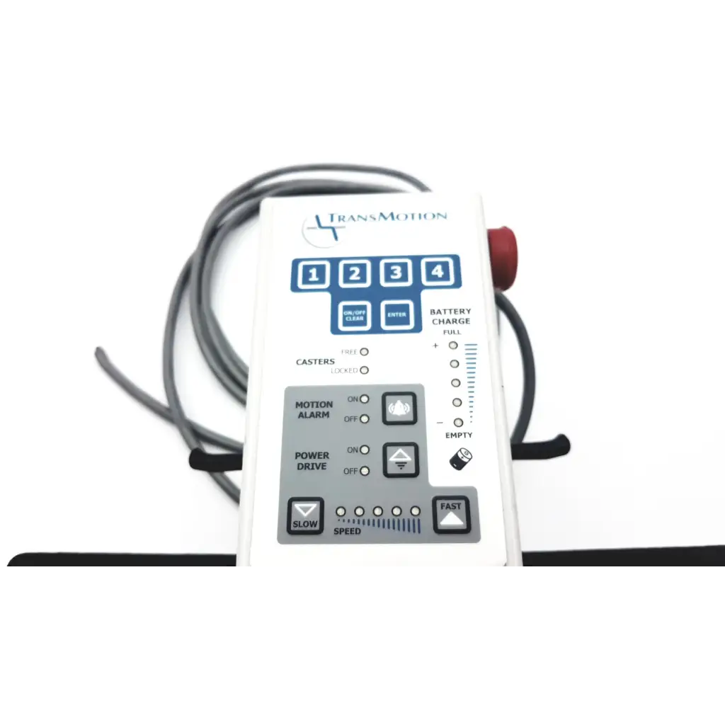 White transmotion medical control box 58311-001 rev h with blue gray buttons battery charge indicator and coiled cables