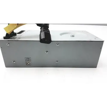 Silver metallic tripp lite hc150sl medical cart power supply unit with black ac input plug and labeled usb port backside