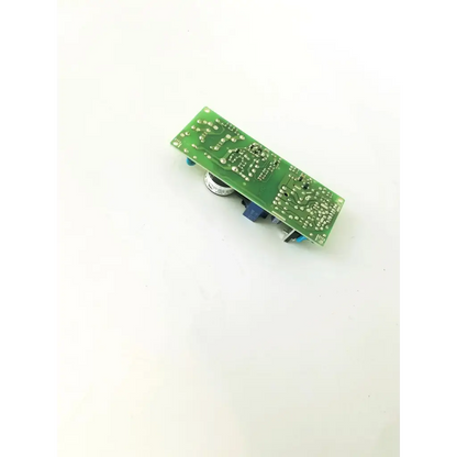 Green rectangular circuit board with silver soldered components and blue connectors for true soltec power supply 3l092