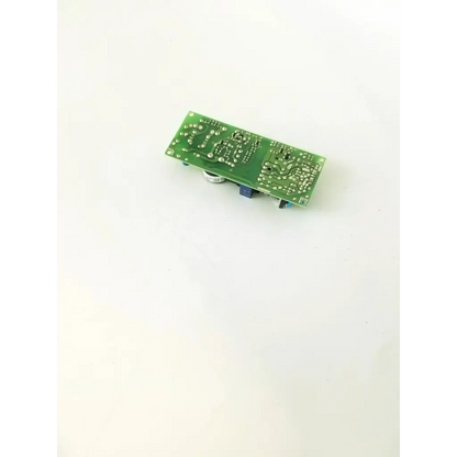Green rectangular true soltec power supply 3l092 board with silver solder points and electronic components mounted on it