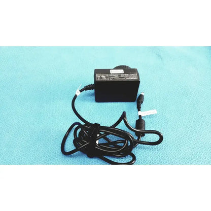 Black plastic fsp015-rcmm medical power supply adapter with coiled cord for trumpower medical power devices