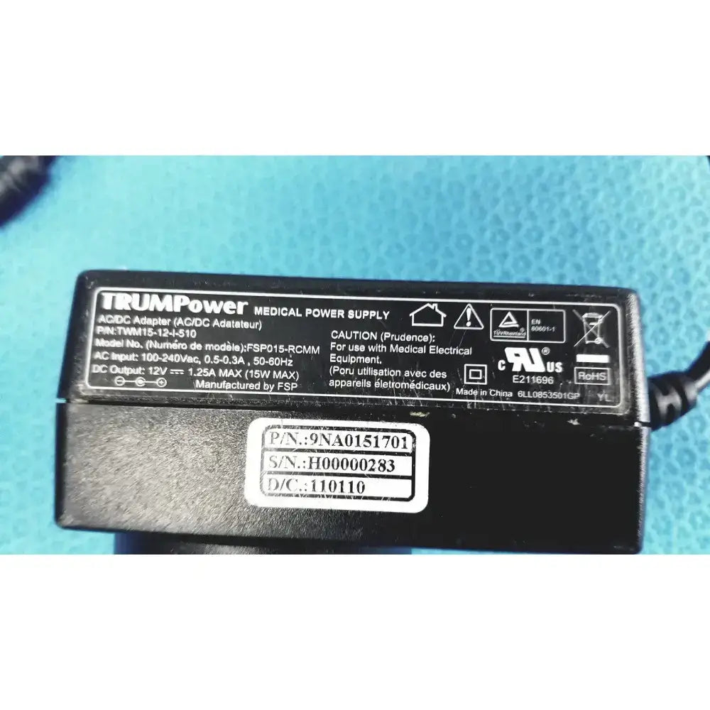 Black trumpower medical power supply adapter fsp015-rcmm with white labeling and certification marks visible