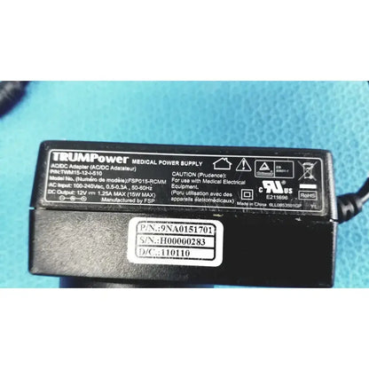Black trumpower medical power supply adapter fsp015-rcmm with white labeling and certification marks visible