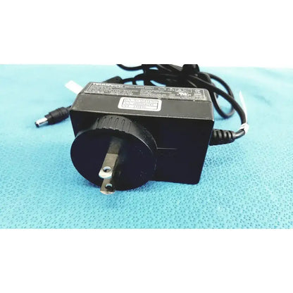 Black plastic trumpower medical power supply fsp015-rcmm ac dc adapter with round plug and coiled power cord