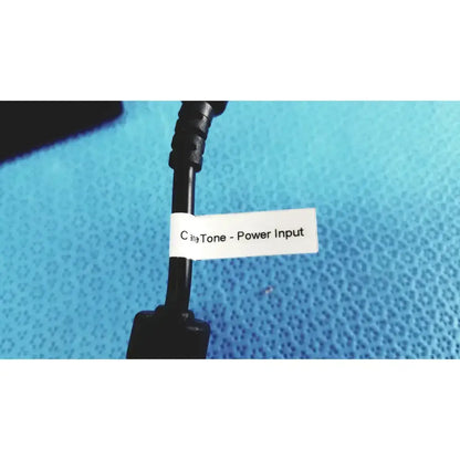 Black power input cable with white label c 319 tone for trumpower medical power supply fsp015-rcmm adapter back side