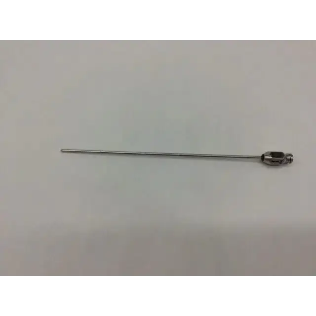 A slender metallic byron infiltration cannula with polished chrome finish and hexagonal threaded tip for precise use