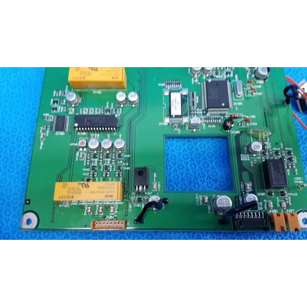Green printed circuit board with yellow capacitors black integrated circuits and silver resistors video interface circuit board for topcon retinal camera