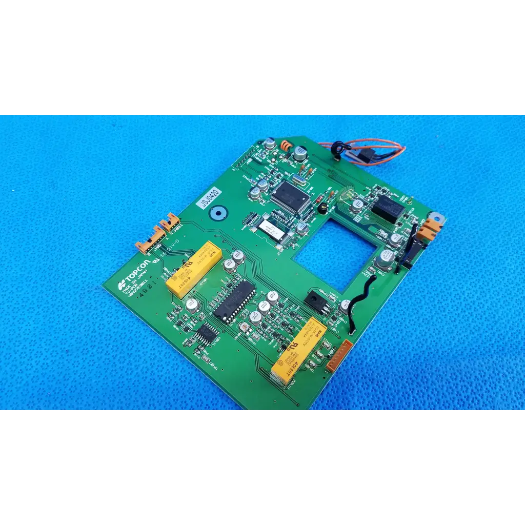 Green printed circuit board with yellow capacitors and black ICs video interface circuit board for topcon retinal camera