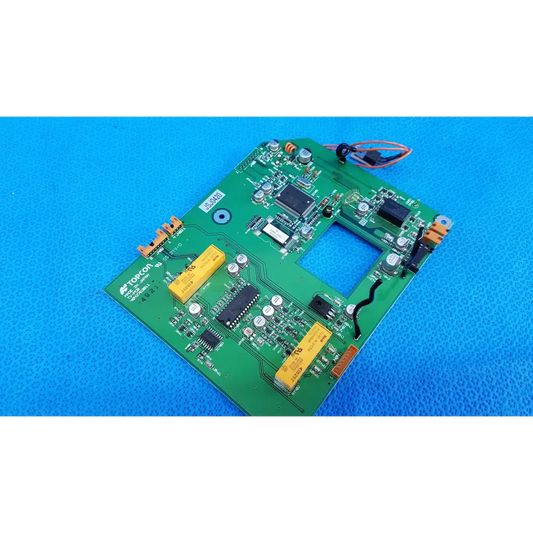 Green printed circuit board with yellow capacitors and black ICs video interface circuit board for topcon retinal camera