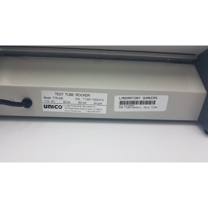 Beige plastic unico test tube rocker ttr-200 designed for gentle mixing of test tubes in laboratory settings