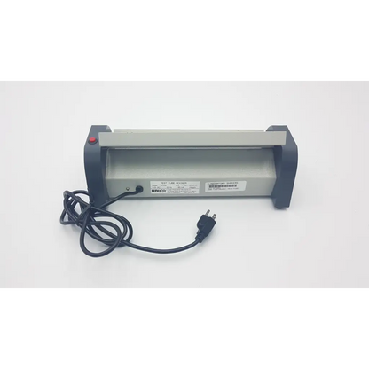 Gray and black plastic unico test tube rocker ttr-200 with red button on top left corner for laboratory use