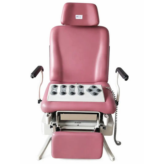 Pink leather-covered united metal fabricators 4011 power medical exam chair table with control panel and adjustable footrest biomed certified