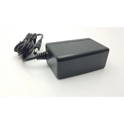 Black rectangular upbright adapter xtd-1501000 ac5-383 with coiled cable and cylindrical connector for power supply