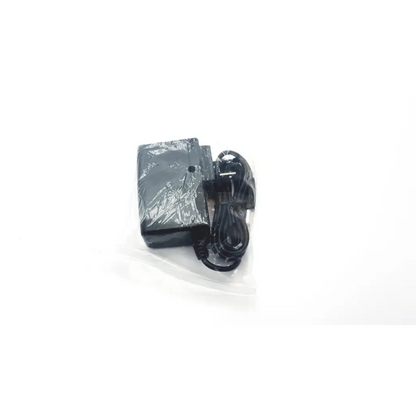 Black plastic upbright xtd-1501000 adapter ad2-75 2923sm with coiled cable wrapped in clear plastic packaging