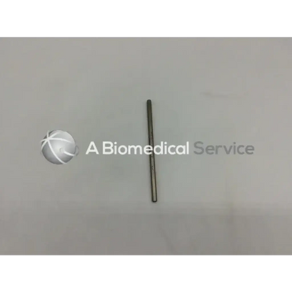 Slender metallic mueller au13702 paparella canal knife with smooth cylindrical body and rounded ends for surgical use