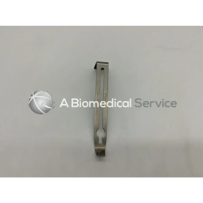 Silver v.mueller ch 1030-003 retractor instrument with sleek polished metallic finish and ergonomic contours