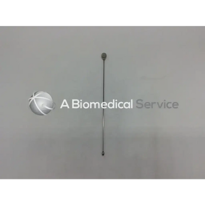A slender metallic otis bougies medical instrument with boule mirror finish and mirror finish olive tip 14 fr