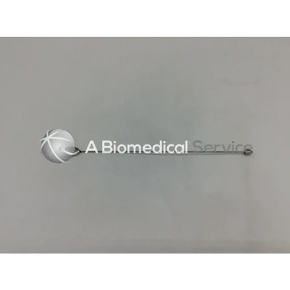 Silver spherical logo with intersecting white lines on metallic bar labeled a biomedical service on v mueller boule mirror finish olive finish olive tip bougies