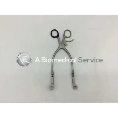 Silver surgical collis retractor with black-handled grips and articulated arms v mueller nl 9215 retractor ad5-63