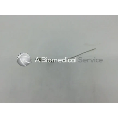 A sleek metallic mcculloch 5fr suction tube with rounded head and slender shaft for precise medical use