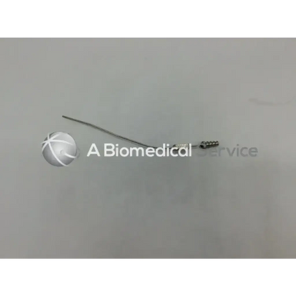 A slender metallic mcculloch 5fr suction tube with a threaded tip and smooth shaft for surgical use