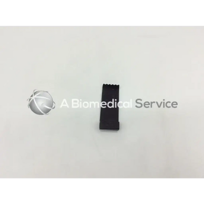 Black rectangular plastic mcculloch retractor blade with serrated top edge for surgical use model nl9702-013