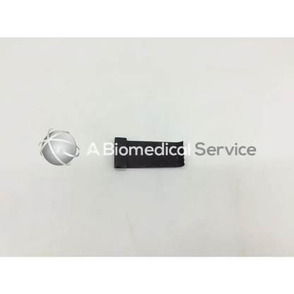 Black rectangular medical component of v mueller mcculloch retractor blade model nl9702-013 for surgical use