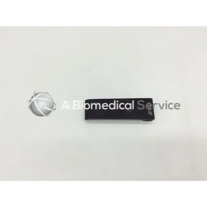 Black rectangular biomedical mcculloch retractor blade with silver logo and text for surgical use by v mueller