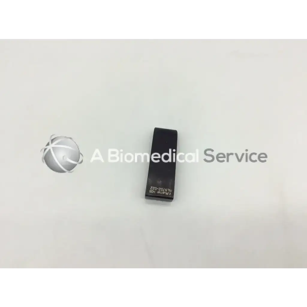 Black rectangular mueller nl9702-022 retractor blade with engraved text for surgical use