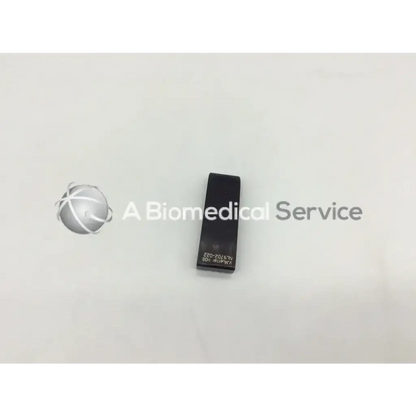 Black rectangular mueller nl9702-022 retractor blade with engraved text for surgical use