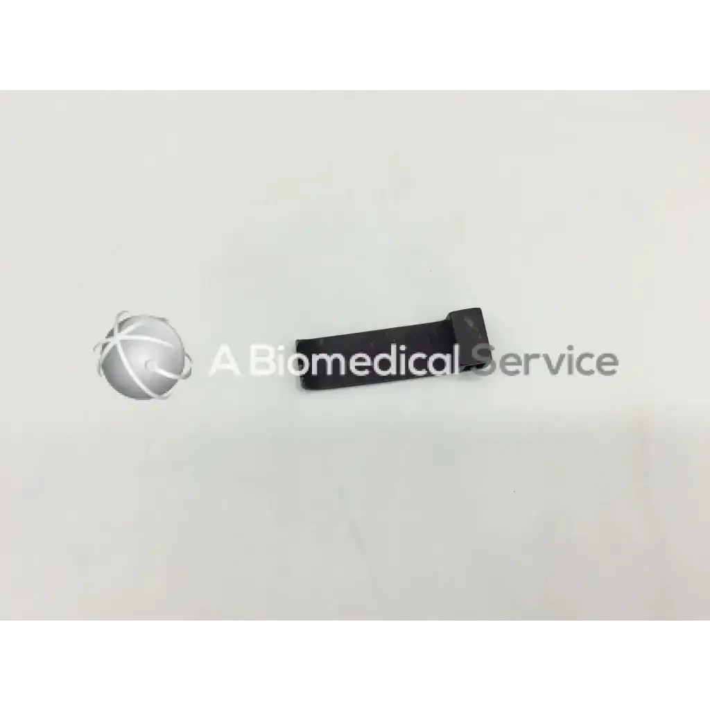 Black plastic retractor blade with rectangular body and rounded ends for mueller nl9702-023 retractor use