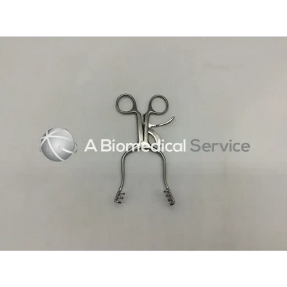 Stainless steel weitlaner retractor ad5-73 with curved handles and serrated toothed tips for surgical use