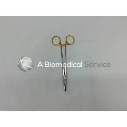 Mueller su16061 vital mayo-hegar needle holder with gold-handled surgical forceps and sleek metallic body
