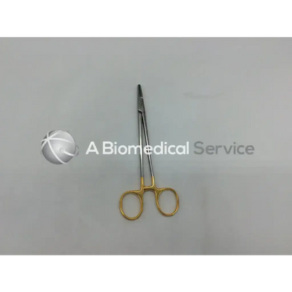 Gold-handled mueller su16061 vital mayo-hegar needle holder with metallic slender body and pointed tips for surgical use