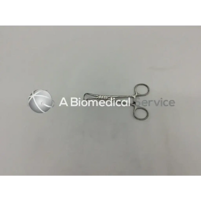 Silver mueller su2905 towel forceps with polished metallic finish and ergonomic finger loops for surgical use