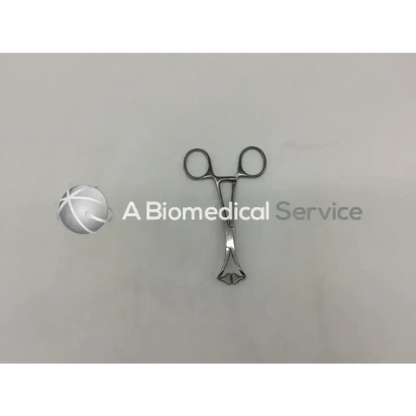 Silver mueller su2936 non-perforating towel forceps with rounded handles and tapered pointed tip for surgical use