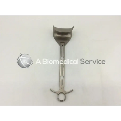 Silver surgical mouth gag with a curved u-shaped head and finger loop handle mueller su3021 balfour center blade