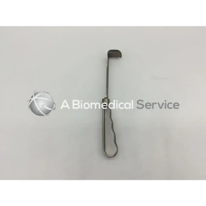Silver mueller su3472 retractor with a curved blade end and ergonomic handle for surgical use