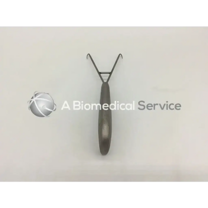 A sleek metallic mueller su3600 berens retractor with polished handle and two curved hooks for dental use