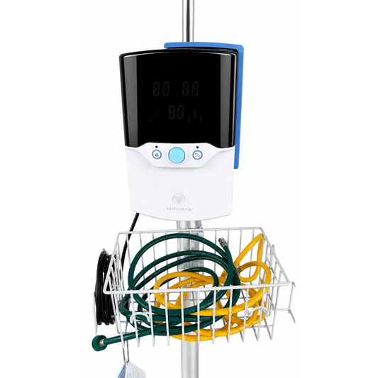 Vaporheim white and black digital precision flow infusion pump with blue control button on metal stand