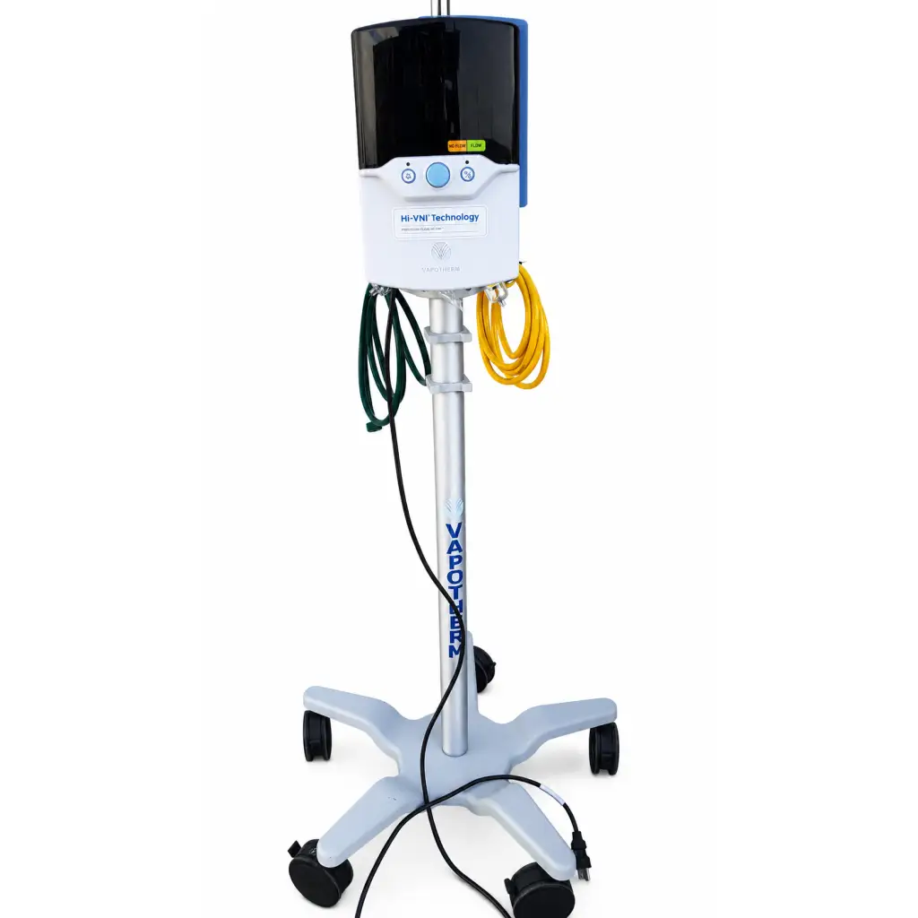 Silver and black vapotherm precision flow plus hi-vni respiratory therapy system on a wheeled biomed certified stand
