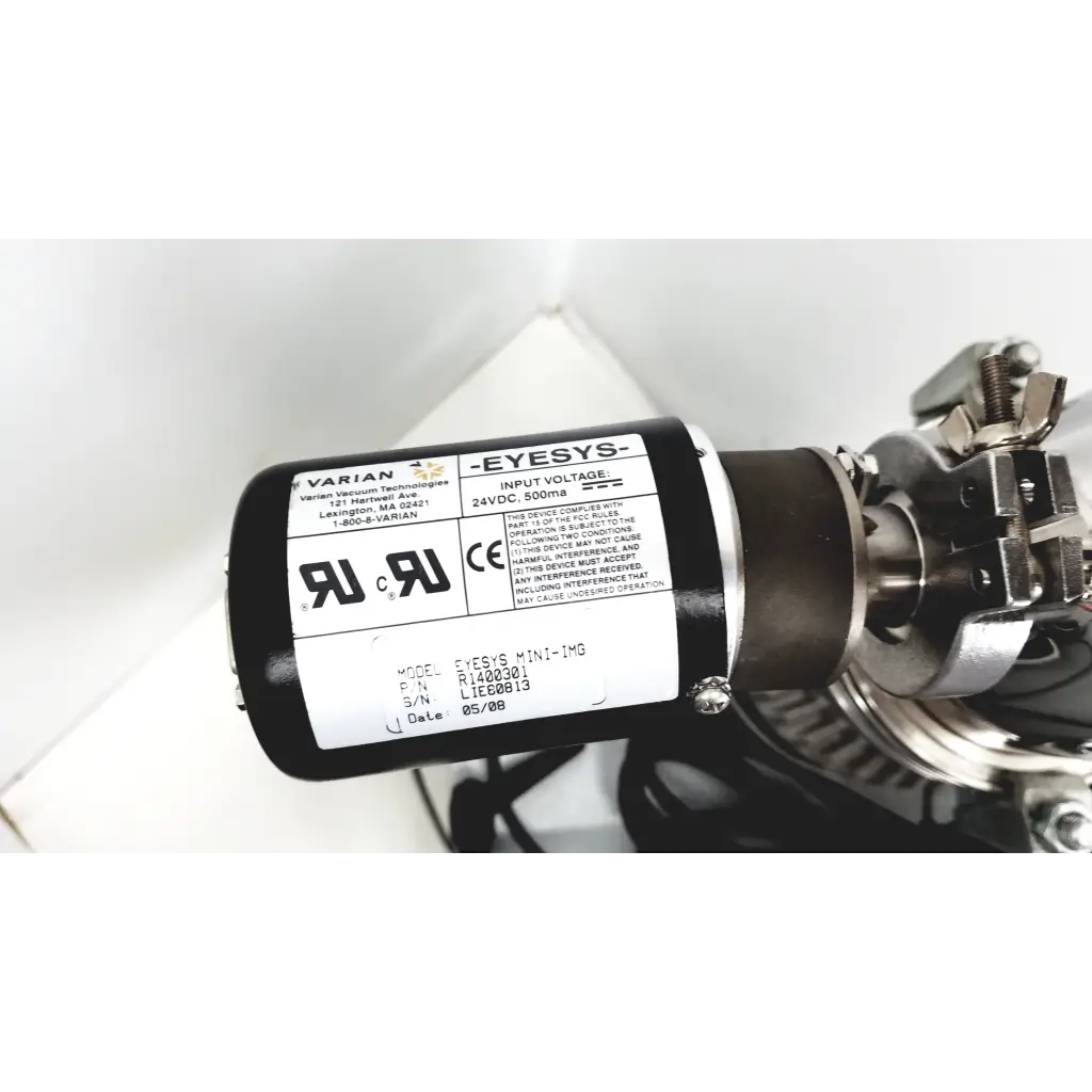 Black cylindrical industrial motor with metallic parts and white label for turbo-v 301-ag navigator vacuum pump system