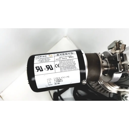 Black cylindrical industrial motor with metallic parts and white label for turbo-v 301-ag navigator vacuum pump system