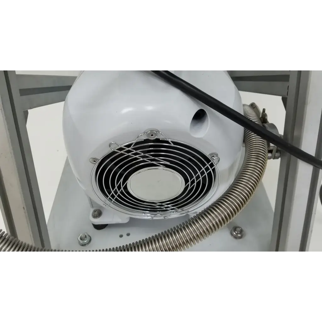 White spherical industrial fan with metallic grille and coiled metal hose on turbo-v 301-ag navigator vacuum pump system