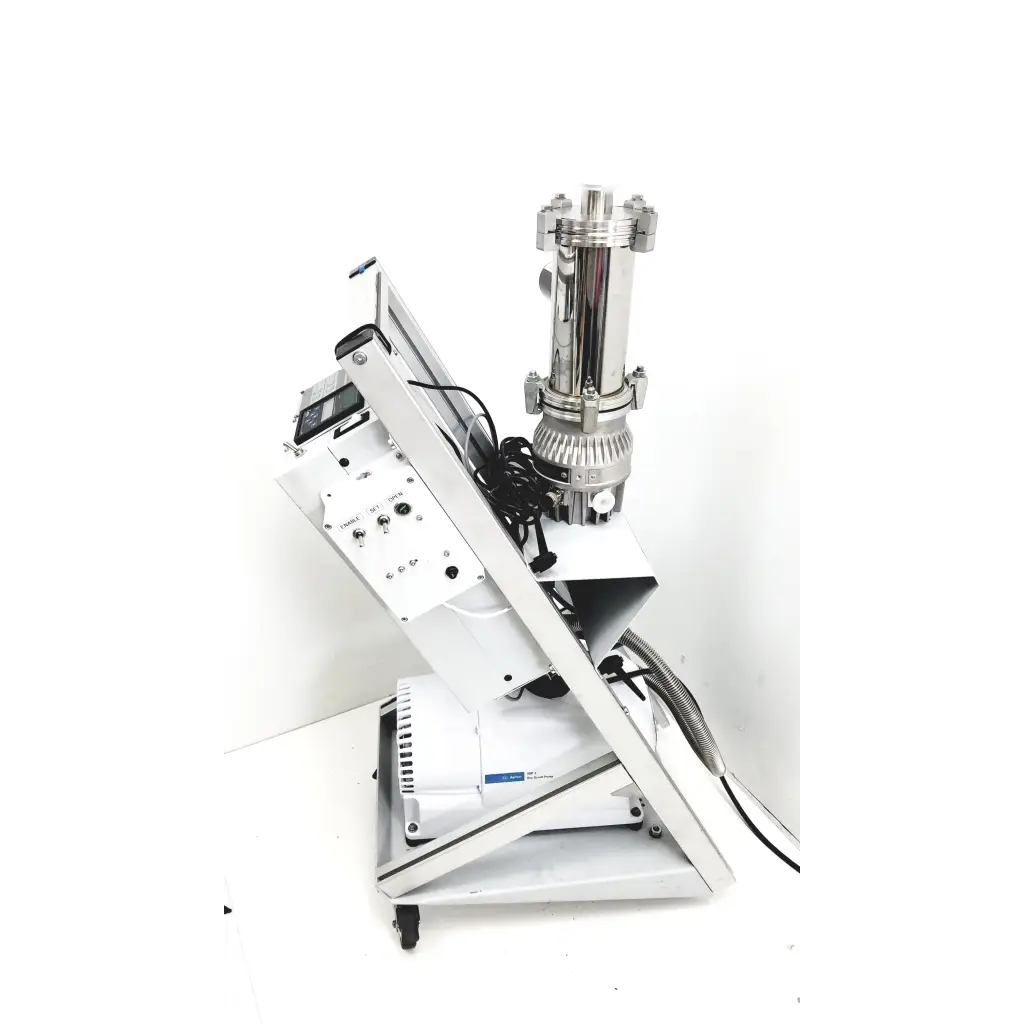 Stainless steel vacuum evaporator with white base and control panel in varian turbo-v 301-ag navigator system