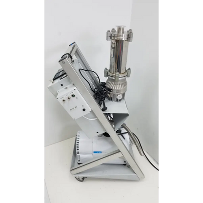 Silver stainless steel turbo-v 301-ag navigator vacuum pump system with control panel mounted on white metal cart with wheels