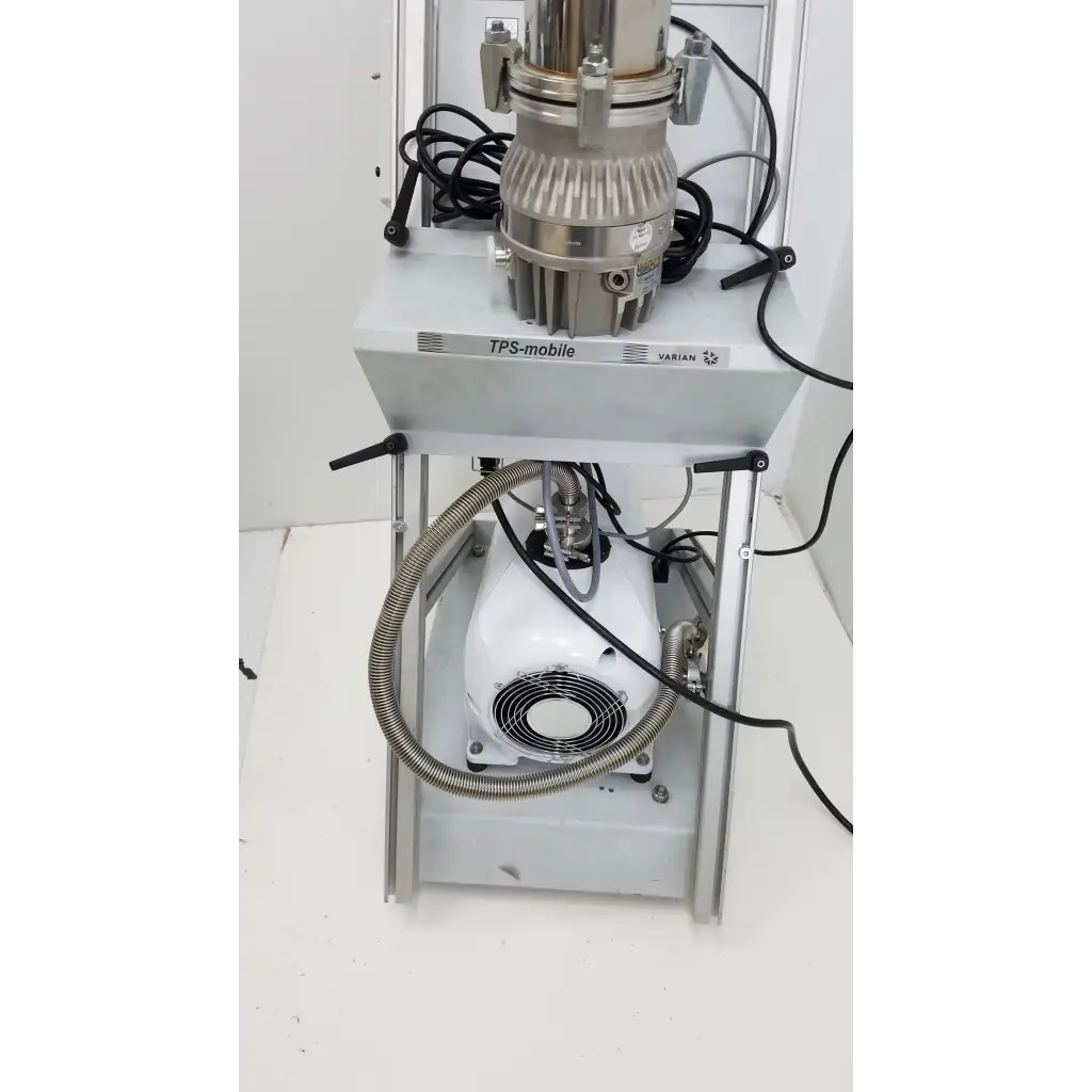 Silver metallic turbo-v 301-ag navigator medical device with white motor unit and black cables for vacuum pumping