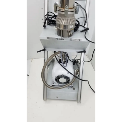 Silver metallic turbo-v 301-ag navigator medical device with white motor unit and black cables for vacuum pumping