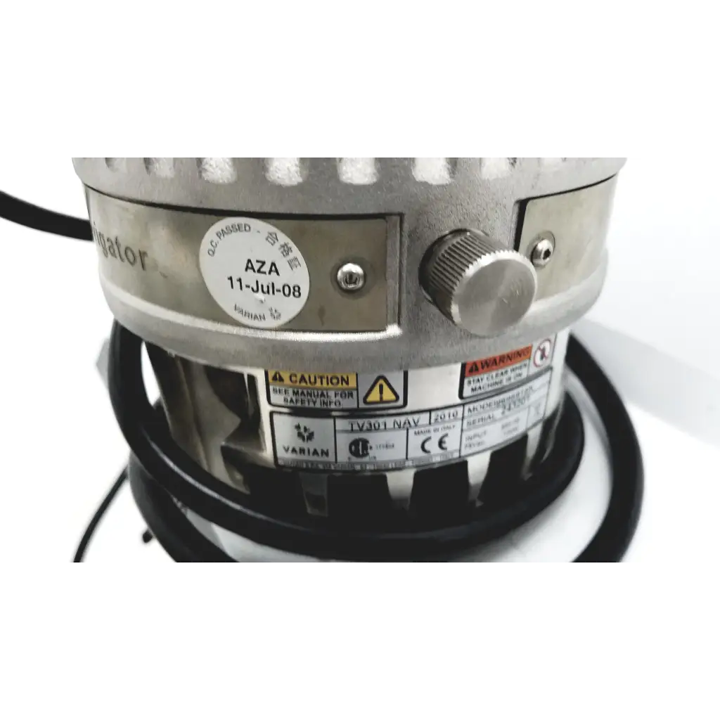 Silver metallic industrial fan motor with textured knob and certification stickers on turbo-v 301-ag navigator vacuum pump system