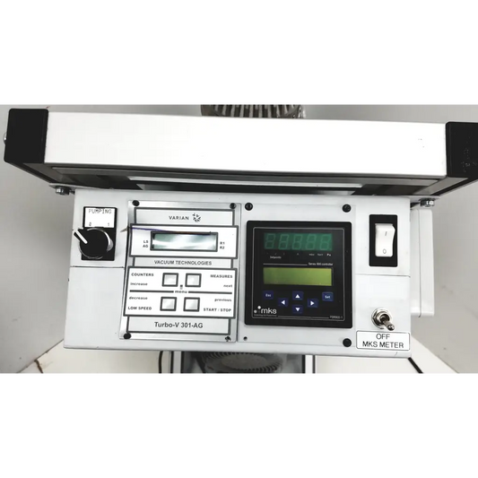 White industrial control panel with digital displays and labeled buttons on turbo-v 301-ag navigator vacuum pump system